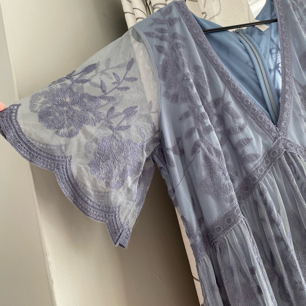 Like new, worn once for a photo shoot. Color is a slate grey/blue.